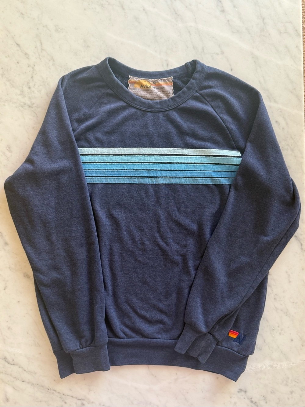 Gentry worn Aviator Nation Navy Sweatshirt with Blue Stripes in size M